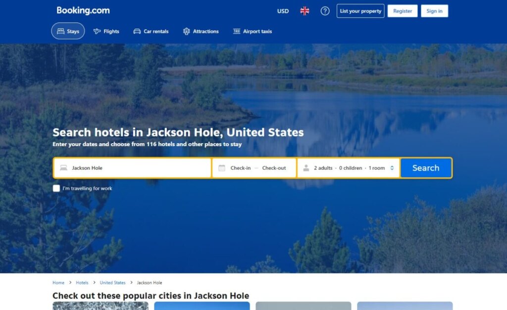 Booking.com search results showing top-rated Jackson Hole hotels near tour departure points