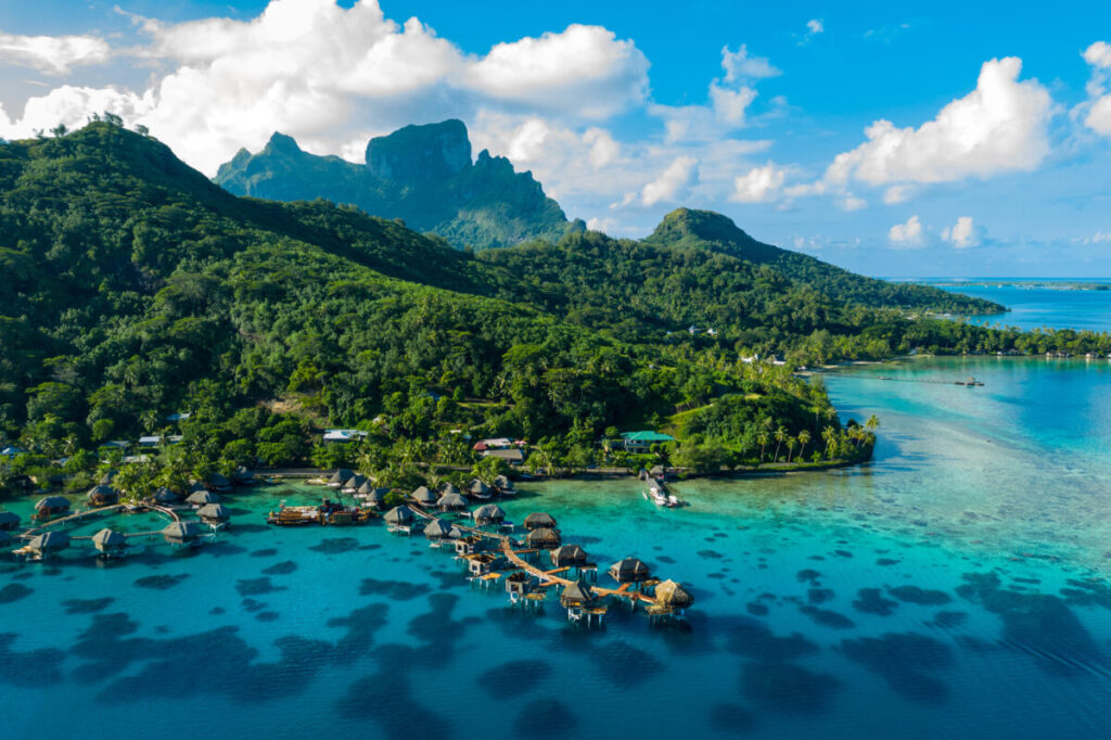 Aerial view of a luxury resort overwater bungalows in Bora Bora, French Polynesia