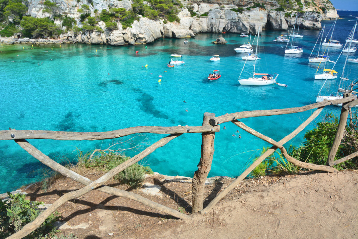 Turquoise water in bay Cala Macarella on Menorca