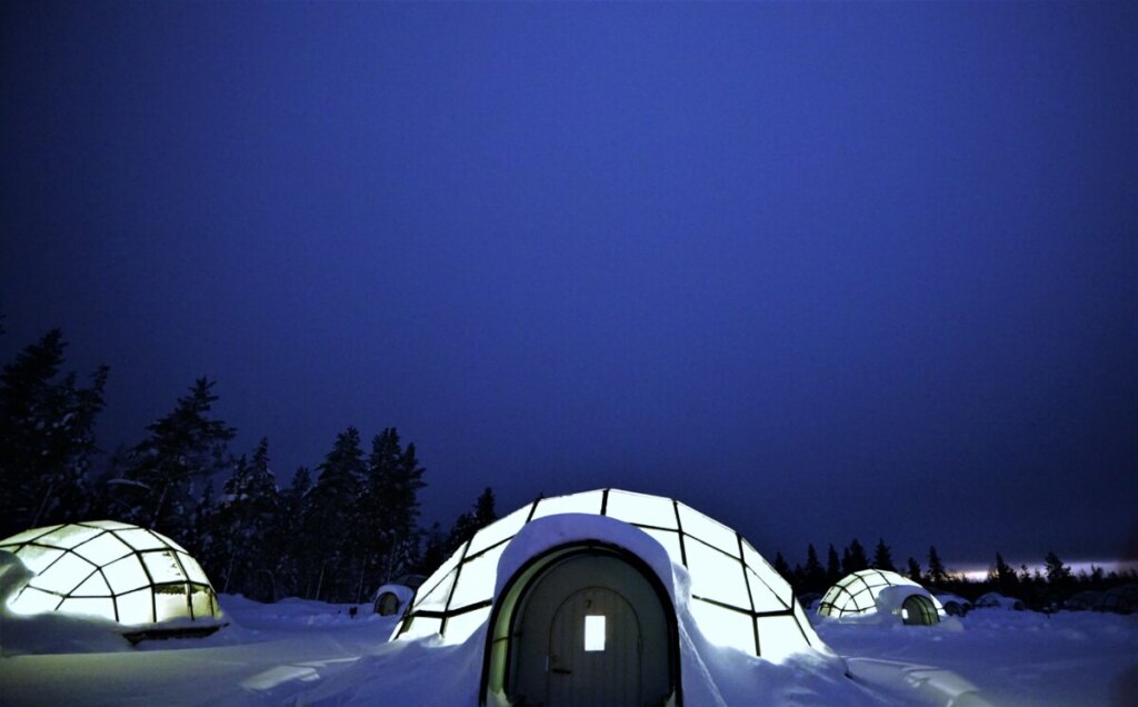 Close-up of glass igloos at night in Finland