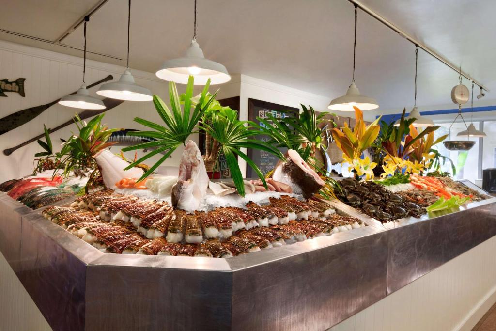 Fresh locally-sourced seafood platter at Hilton Guam Resort highlighting wellness dining