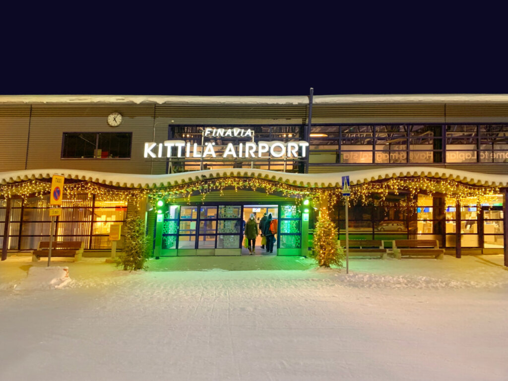 Entrance of the Kittilä Airport in Finland decorated with Christmas trees and lights