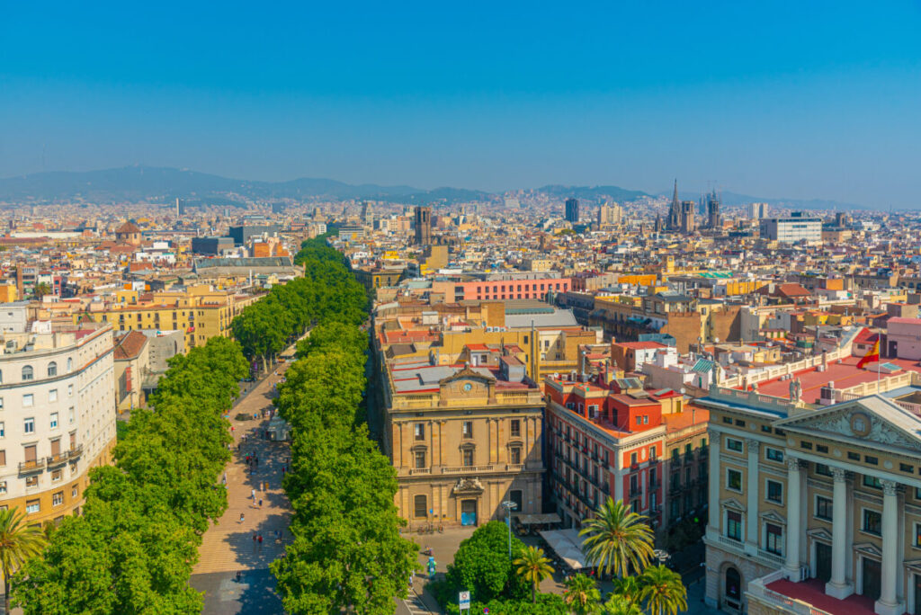 Aerial view of La Rambla boulevard and Barcelona, Spain cityscape