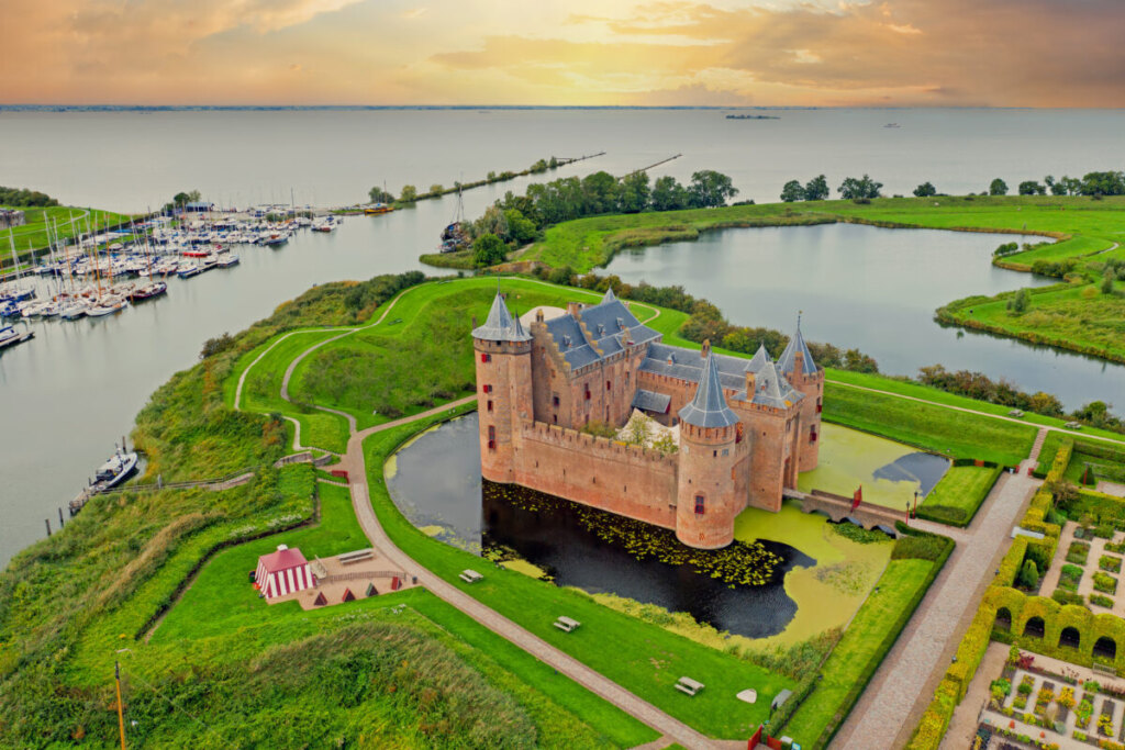 Muiderslot medieval castle Netherlands with drawbridge moat and defensive towers