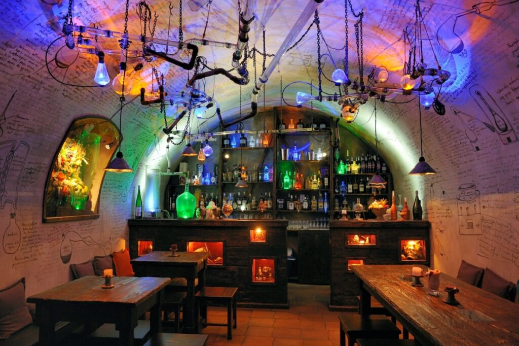 Interior view of the Museum of Alchemists and Magicians of Old Prague, showcasing mystical artifacts and historical displays