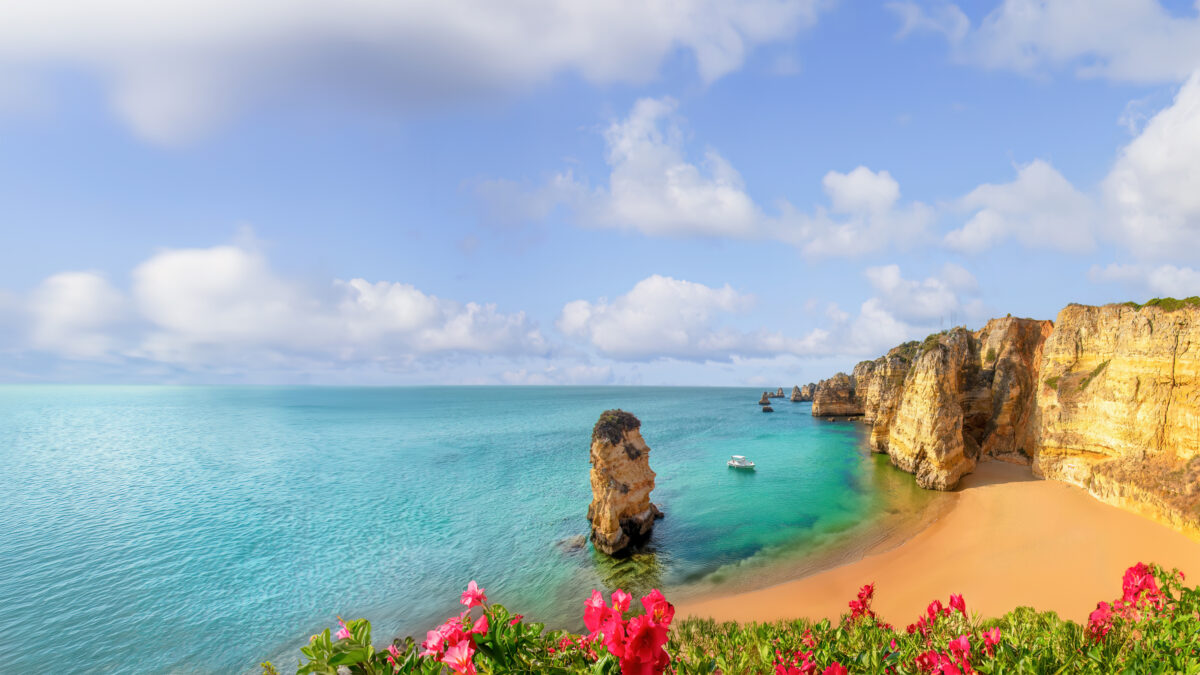 A view of the beach and coastline at Praia da Marinha, Algarve, Portugal.