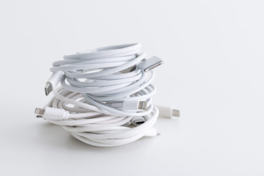 Several charging cables rolled up and secured, showcasing a tidy arrangement for convenient use and storage