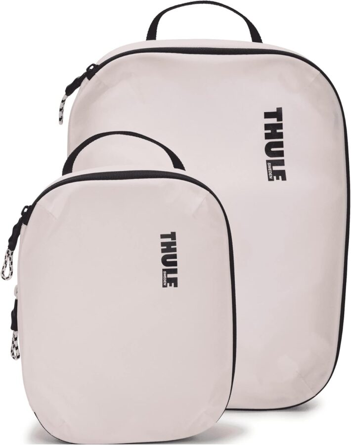 Thule compression packing cubes organized in suitcase for efficient travel packing